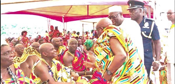 Dr Archibald Yao Letsa (right), Volta Regional Minister, greeting Togbe Afede XIV, as the latter sits in state with his chiefs and elders